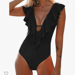 Sexy one piece flattering for all!